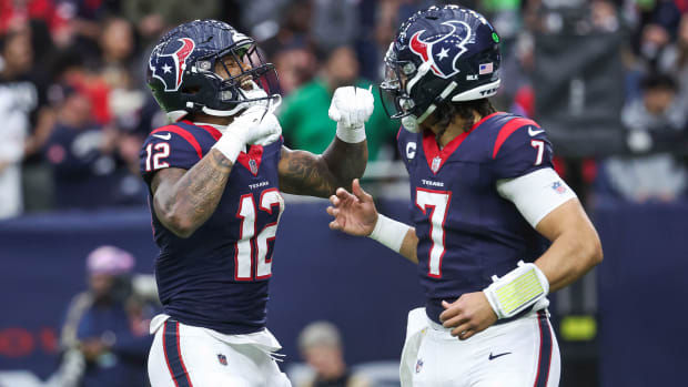 C.J. Stroud reaches out to shake Nico Collins’s hands